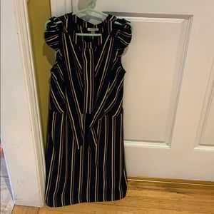 navy blue dress with orange and yellow stripes